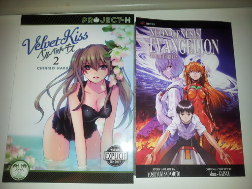 Velvet Kiss volume two and Evangelion volume 13