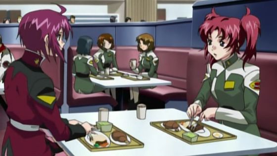 Lunamaria and Meyrin in the cafeteria.
